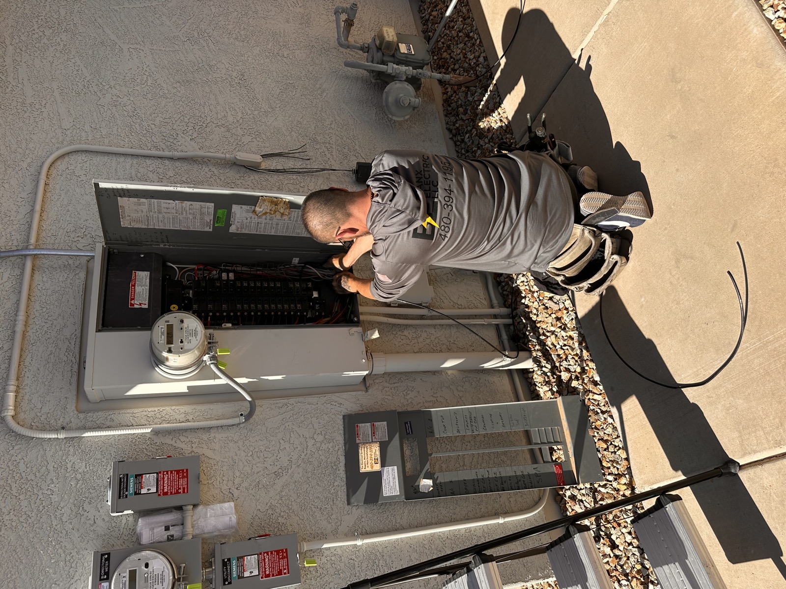 Banx Electric crew doing panel upgrade